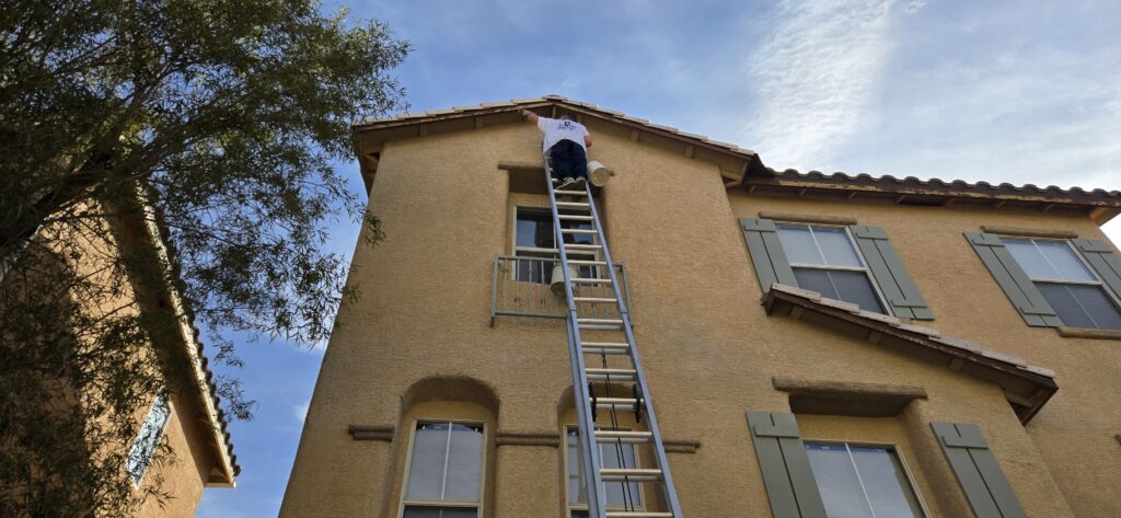 Exterior house painting on a home in The Lakes, Las Vegas by New Visions Painters