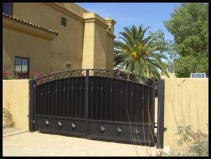 Freshly painted driveway gate by New Visions Painters in Las Vegas