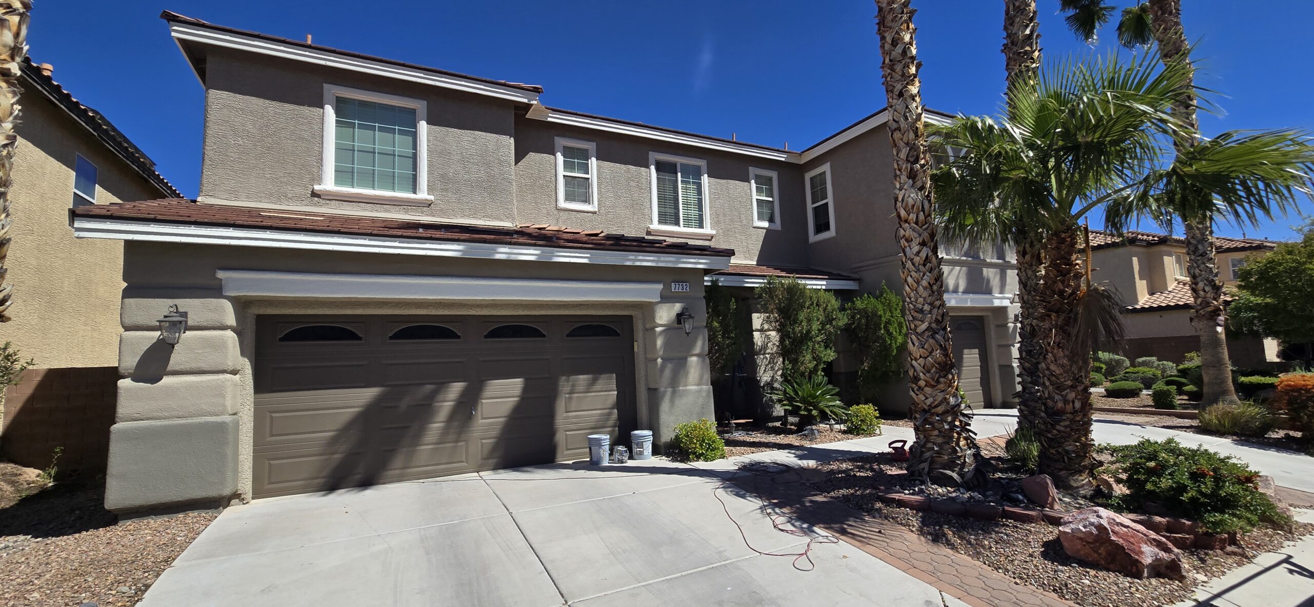 Exterior stucco house repainted by New Visions Painters in Henderson, Las Vegas