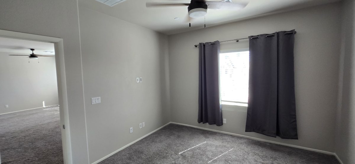 Repainted bedroom with smooth ceiling and walls