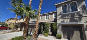 Two-story stucco exterior repainted in Henderson NV near Cadence